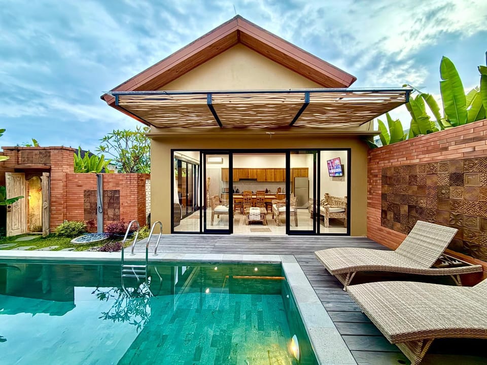 Property building, Day, Living room, Seating area, Pool view, Swimming pool, sunbed