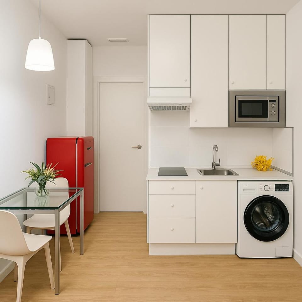Kitchen or kitchenette, Living room, Seating area, stove, washing machine, dryer