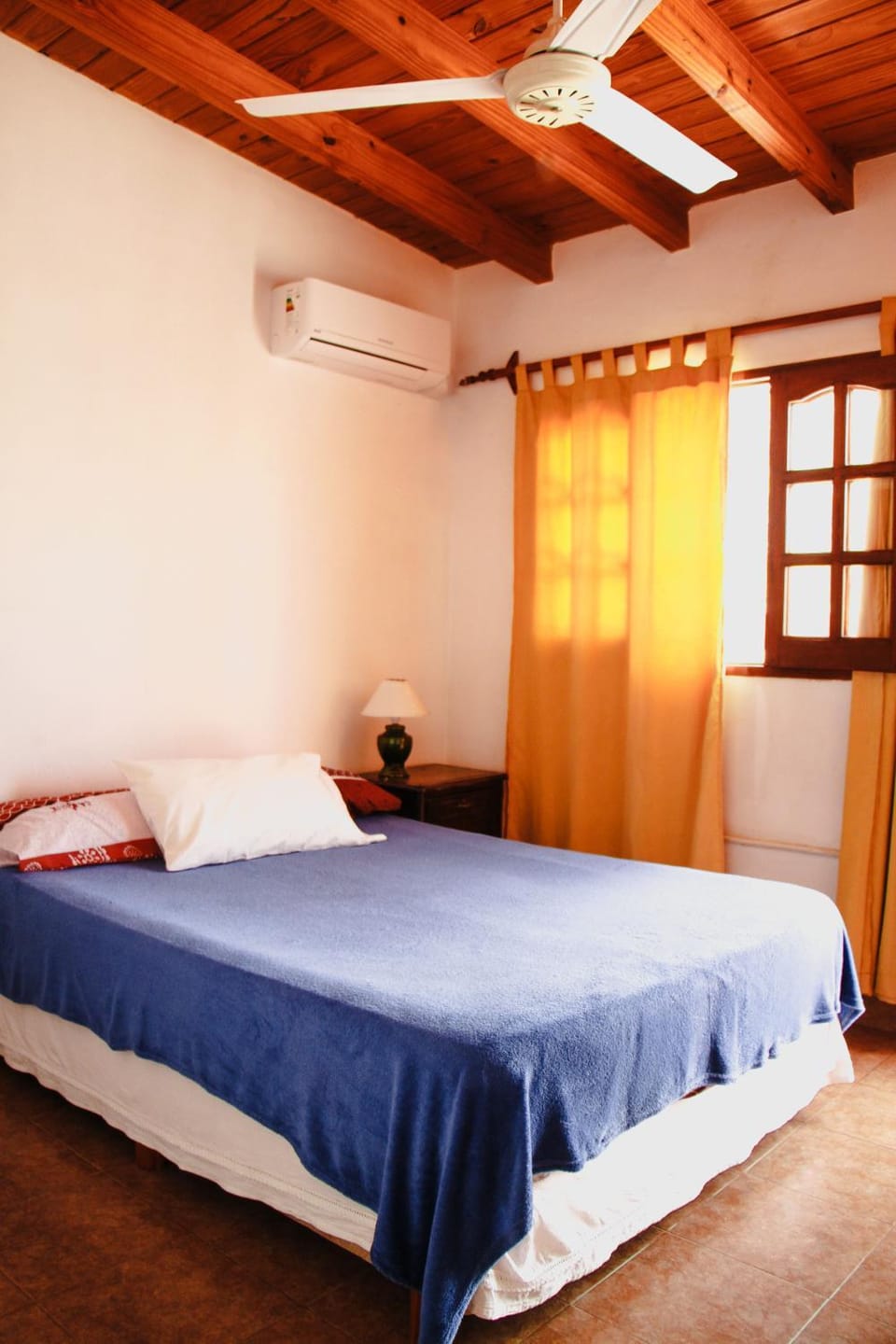 Photo of the whole room, air conditioner