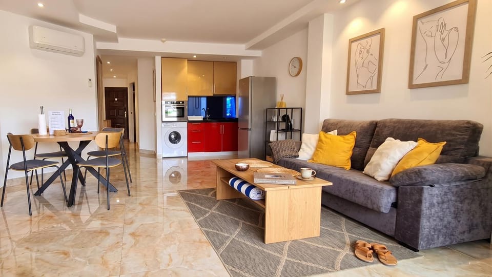 Kitchen or kitchenette, Seating area, Dining area, oven, stove, toaster, washing machine