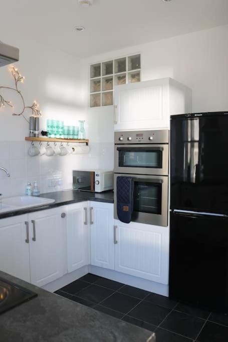 Kitchen or kitchenette, oven