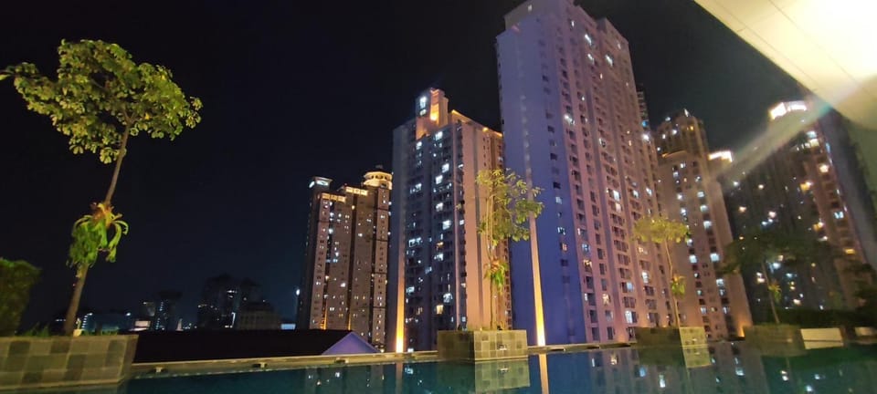 Property building, Night, City view, Swimming pool