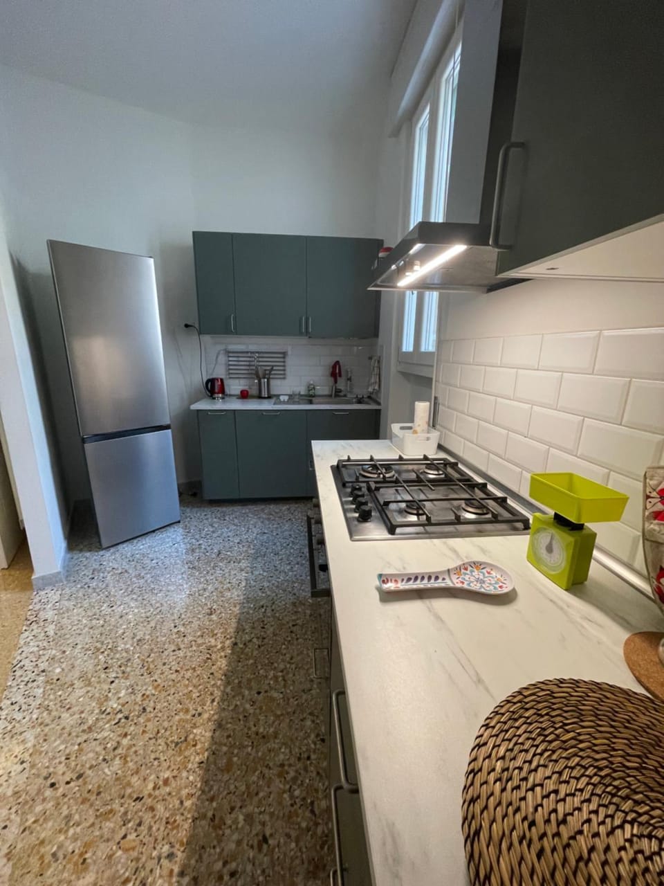 Kitchen or kitchenette, dishwasher, oven, stove
