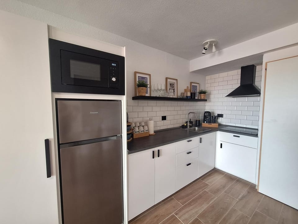 Kitchen or kitchenette, stove