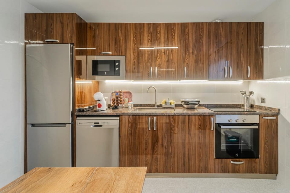 Kitchen or kitchenette, stove, toaster