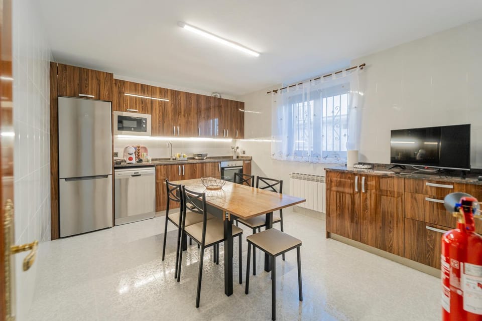 Kitchen or kitchenette, dishwasher, oven, stove