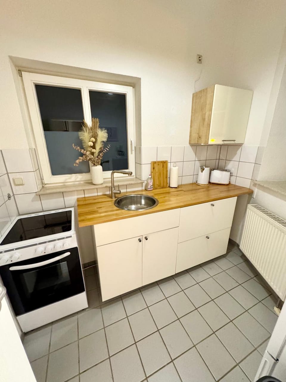 Kitchen or kitchenette, stove, toaster
