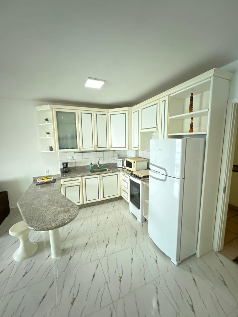 Kitchen or kitchenette, oven, stove