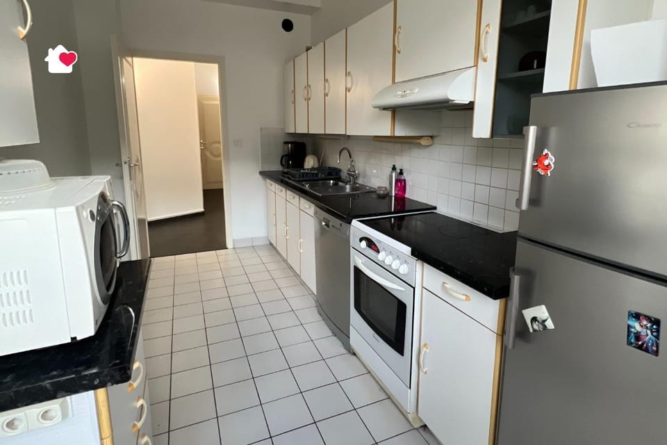 Kitchen or kitchenette, dishwasher, oven, stove, toaster