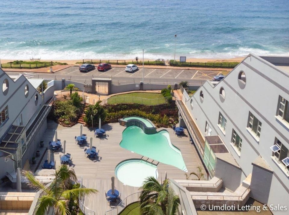 Property building, Beach, Swimming pool