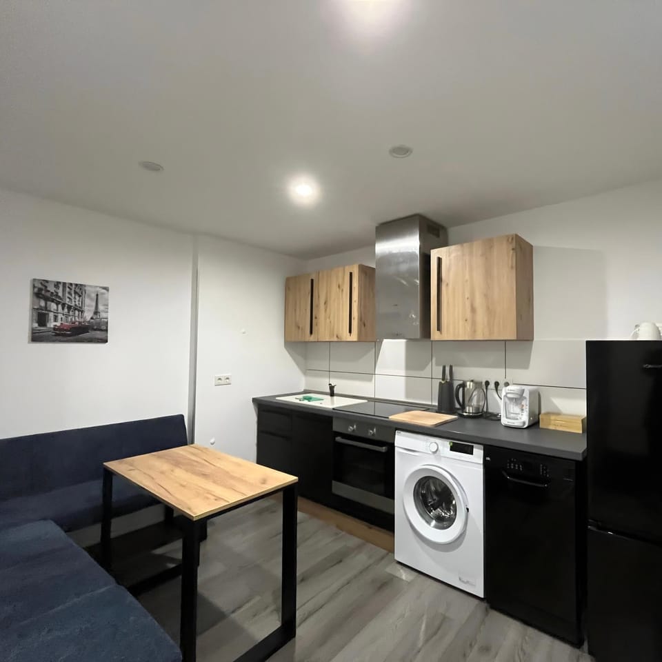 Kitchen or kitchenette, Seating area, Dining area, dishwasher, oven, stove, washing machine