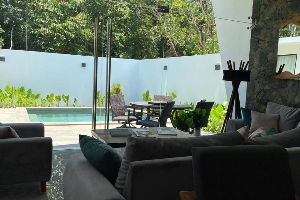 Patio, View (from property/room), Living room, Seating area, Dining area, Garden view, Pool view, Swimming pool