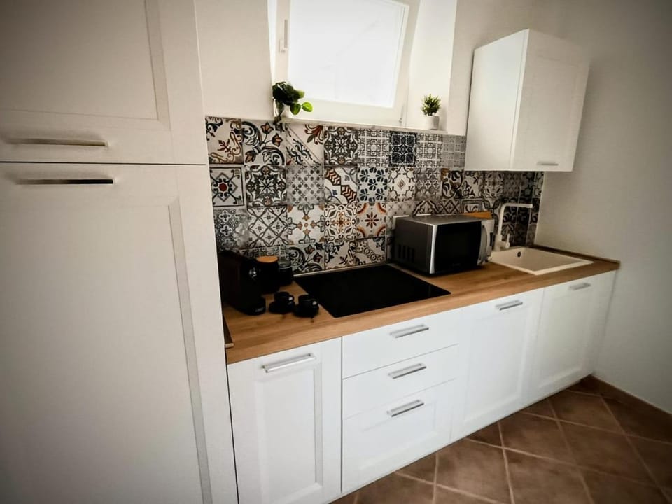 Kitchen or kitchenette, stove