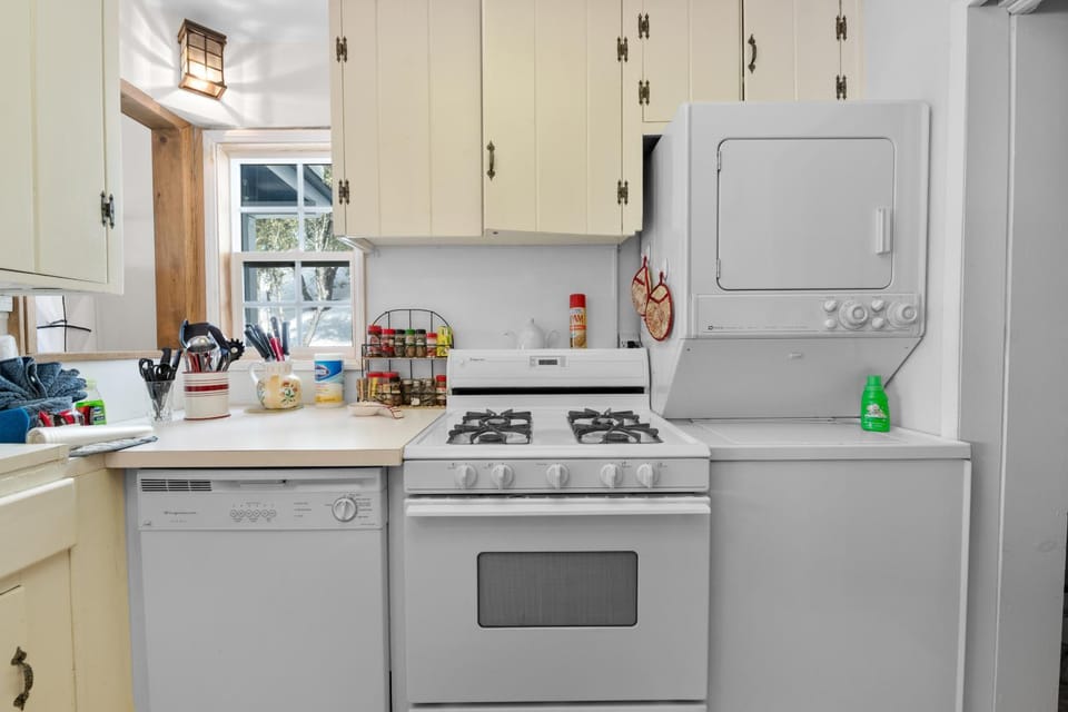 Kitchen or kitchenette, dishwasher, stove, washing machine, dryer