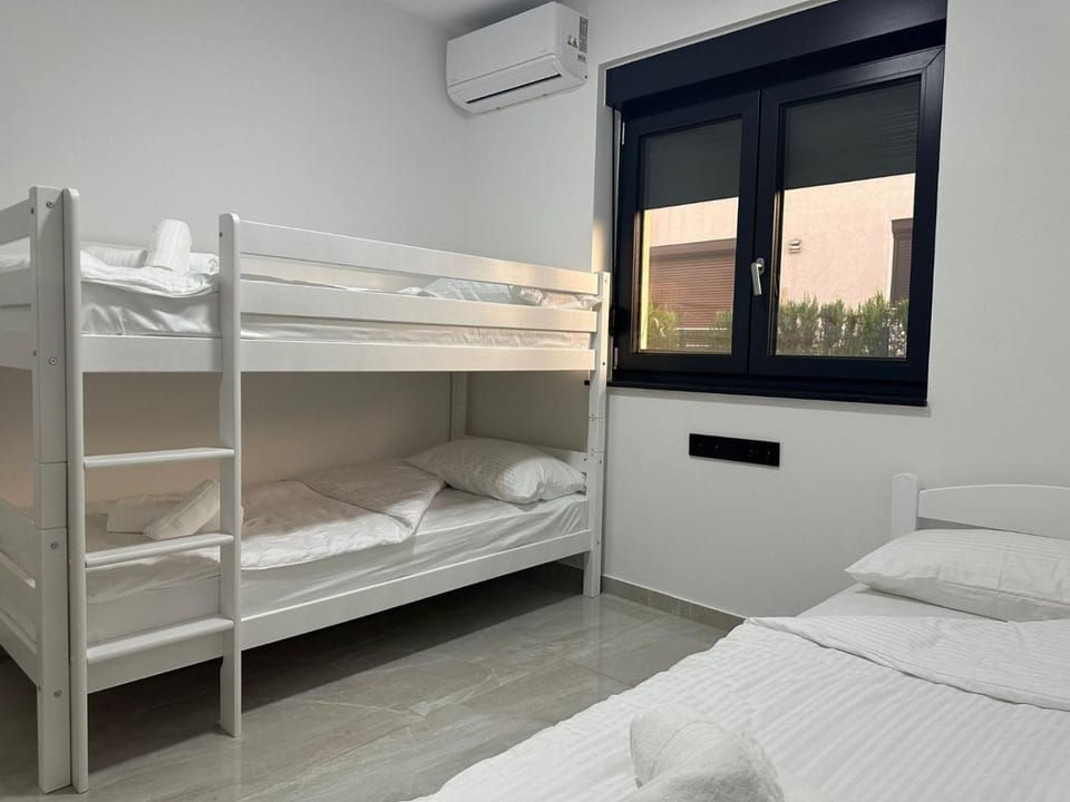Bed, Bedroom, bunk bed, towels, air conditioner