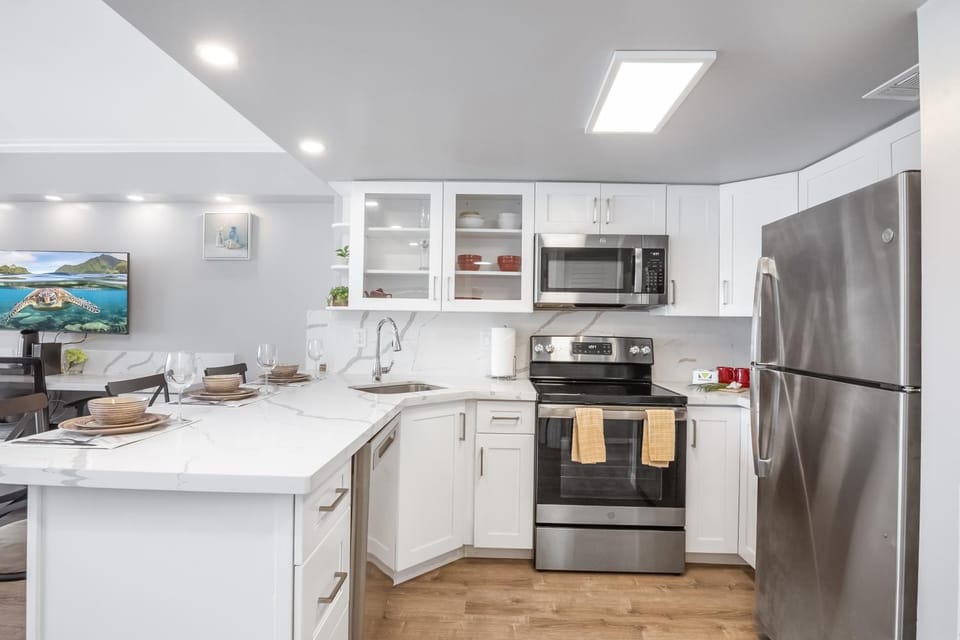 Kitchen or kitchenette, dishwasher, oven, stove, toaster