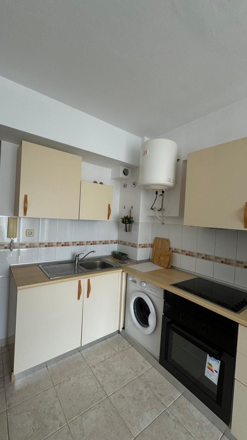 Kitchen or kitchenette, oven, stove