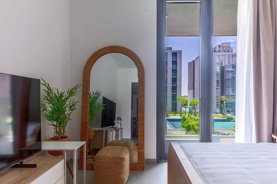 Sahab - Boho Studio pool view Apartment in Al Sharjah