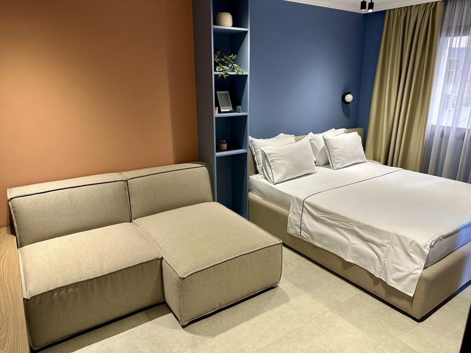 Bed, Seating area, Bedroom