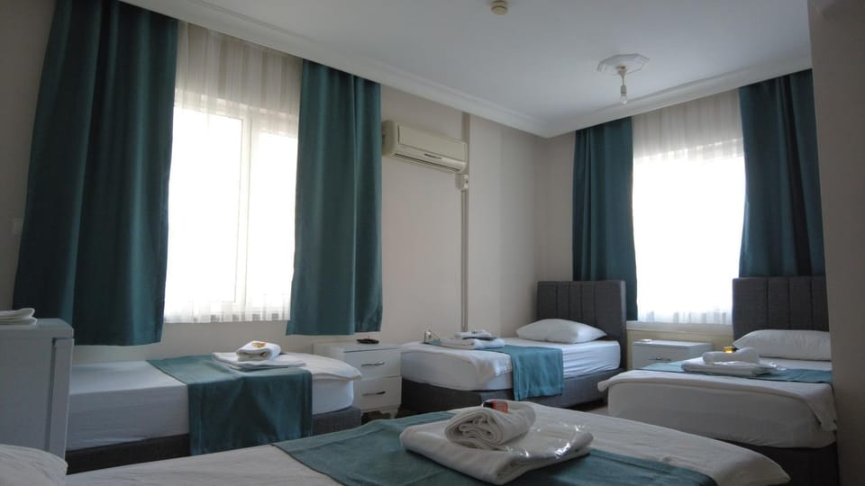 Bed, Living room, Photo of the whole room, Bedroom, towels, air conditioner