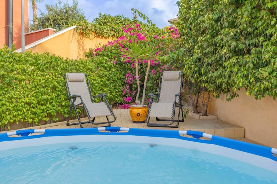 Property building, Living room, Swimming pool