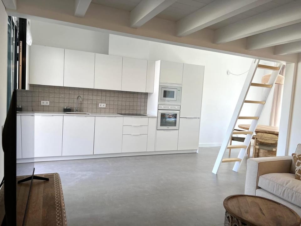Kitchen or kitchenette, Living room, microwave, oven, stove