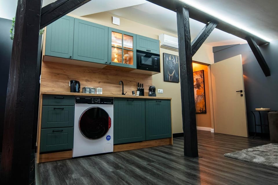 Kitchen or kitchenette, stove, washing machine