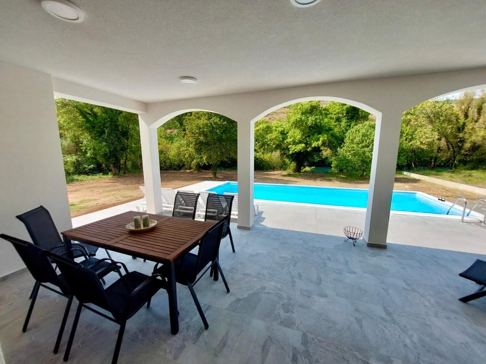 Patio, Seating area, Dining area, Pool view, Swimming pool, Swimming pool, sunbed