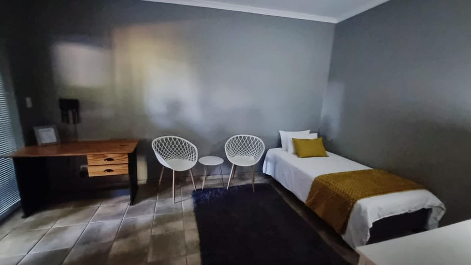 Bed, Living room, Seating area