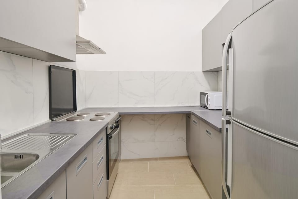 Kitchen or kitchenette, oven, stove