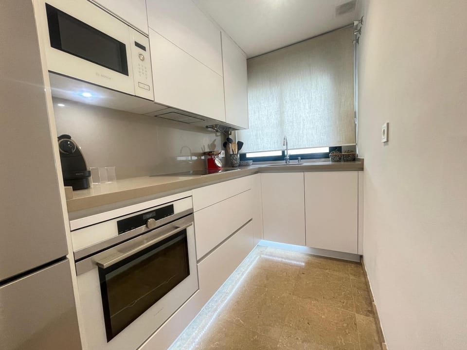 Kitchen or kitchenette, heating, oven, stove, air conditioner