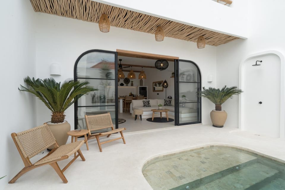Shower, Property building, View (from property/room), Living room, Seating area, Pool view, Swimming pool