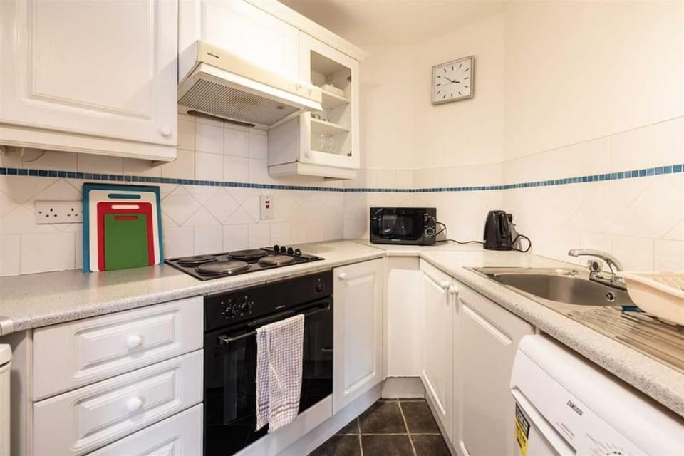 minibar, oven, toaster, washing machine