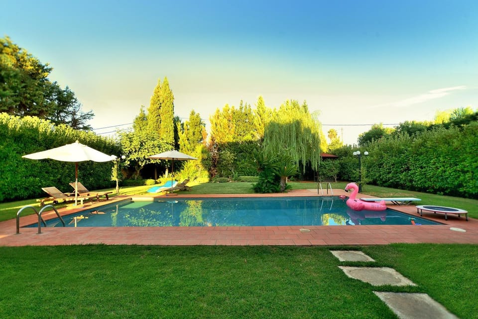 Property building, Living room, Swimming pool