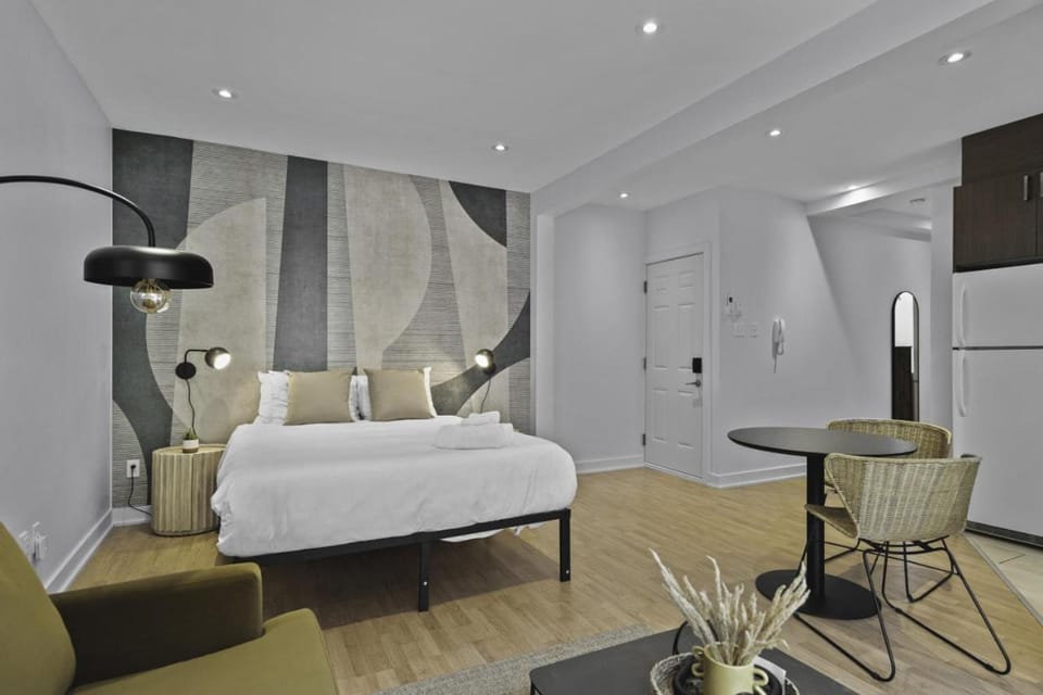 Bed, Living room, Seating area, Bedroom