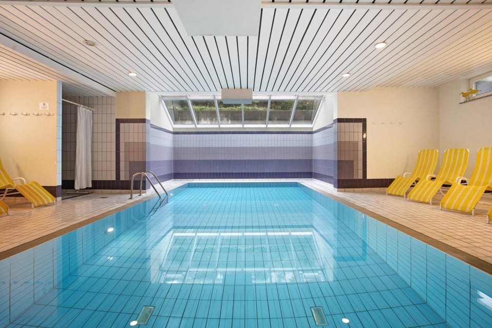 Property building, Living room, Swimming pool