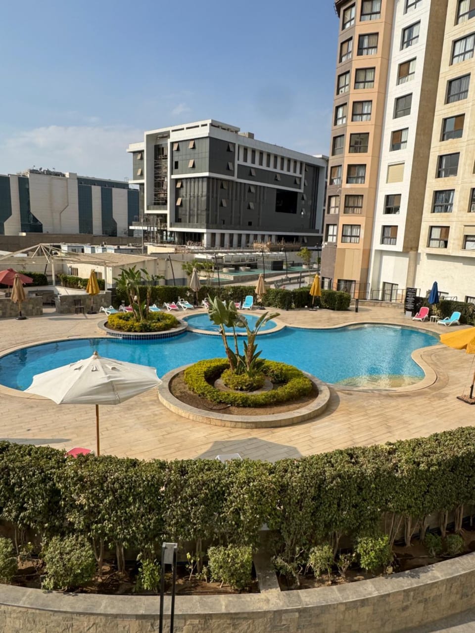 Property building, Day, Pool view, Swimming pool, sunbed