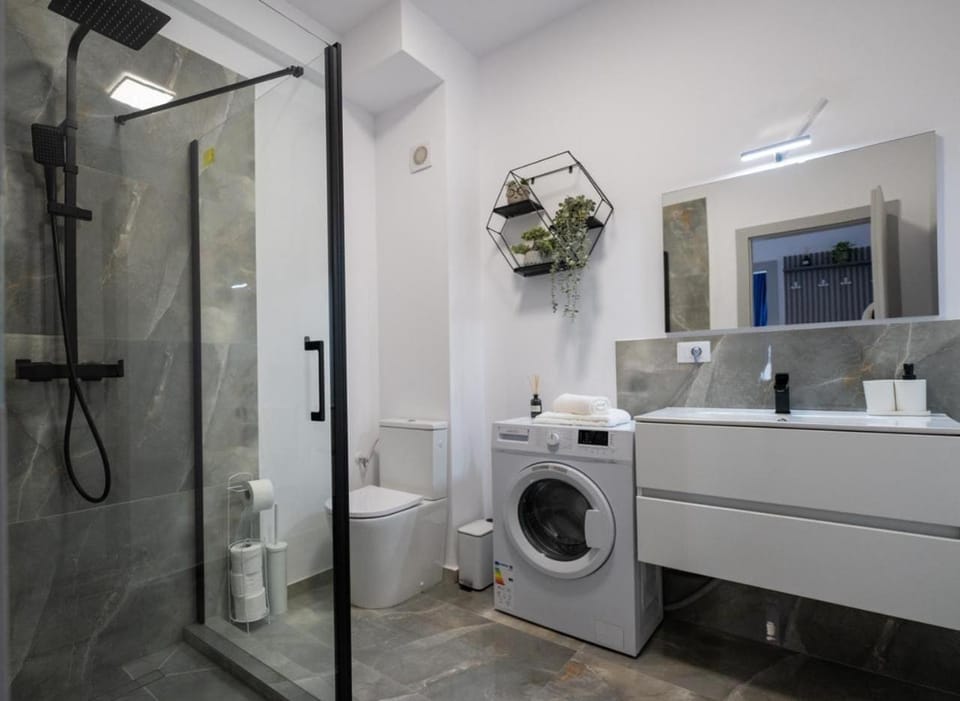 Shower, Bathroom, towels, washing machine, dryer