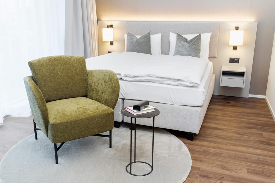 Bed, Seating area, Bedroom