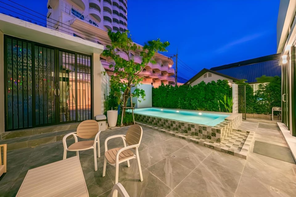 Patio, Night, Pool view, Swimming pool, sunbed
