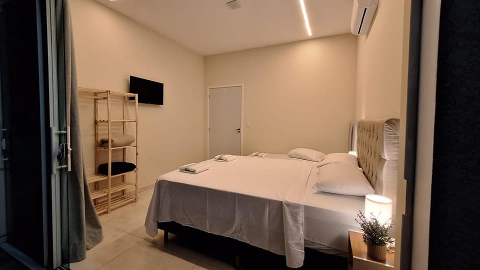 Bed, TV and multimedia, Bedroom, towels, air conditioner