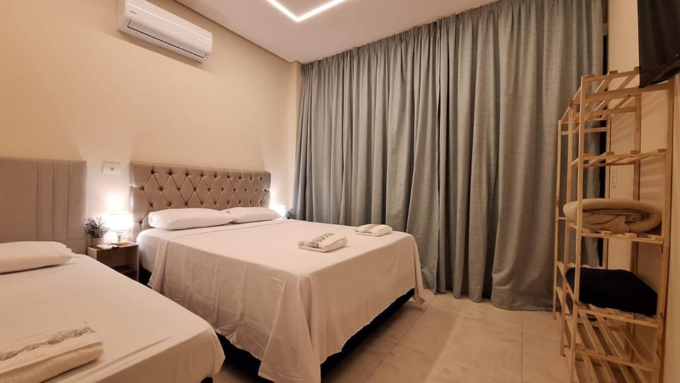Bed, Bedroom, towels, air conditioner