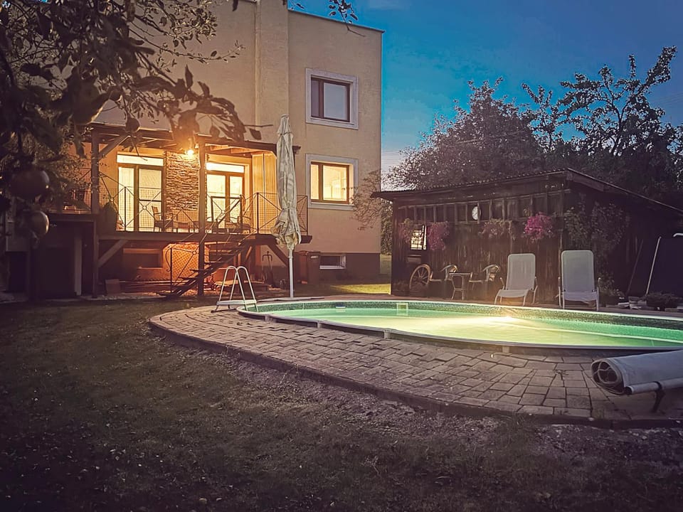 Property building, Night, Garden, Pool view, Swimming pool