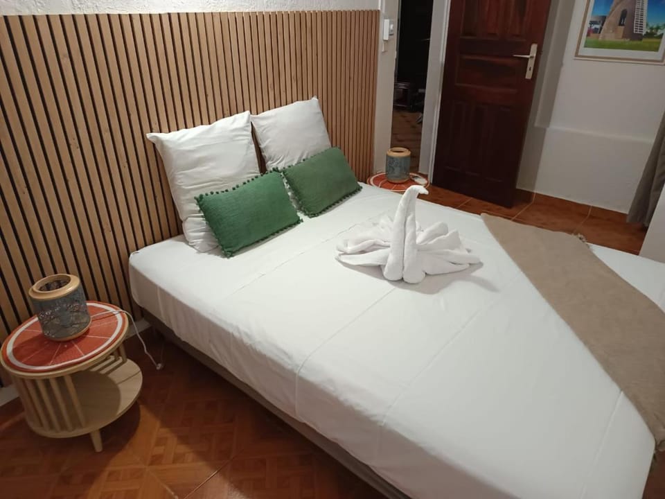 Bed, Bedroom, towels, wardrobe, air conditioner