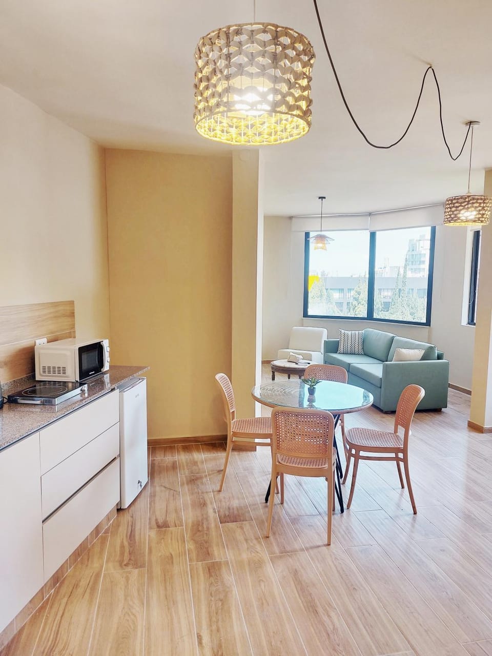 Kitchen or kitchenette, Living room, Seating area, Dining area
