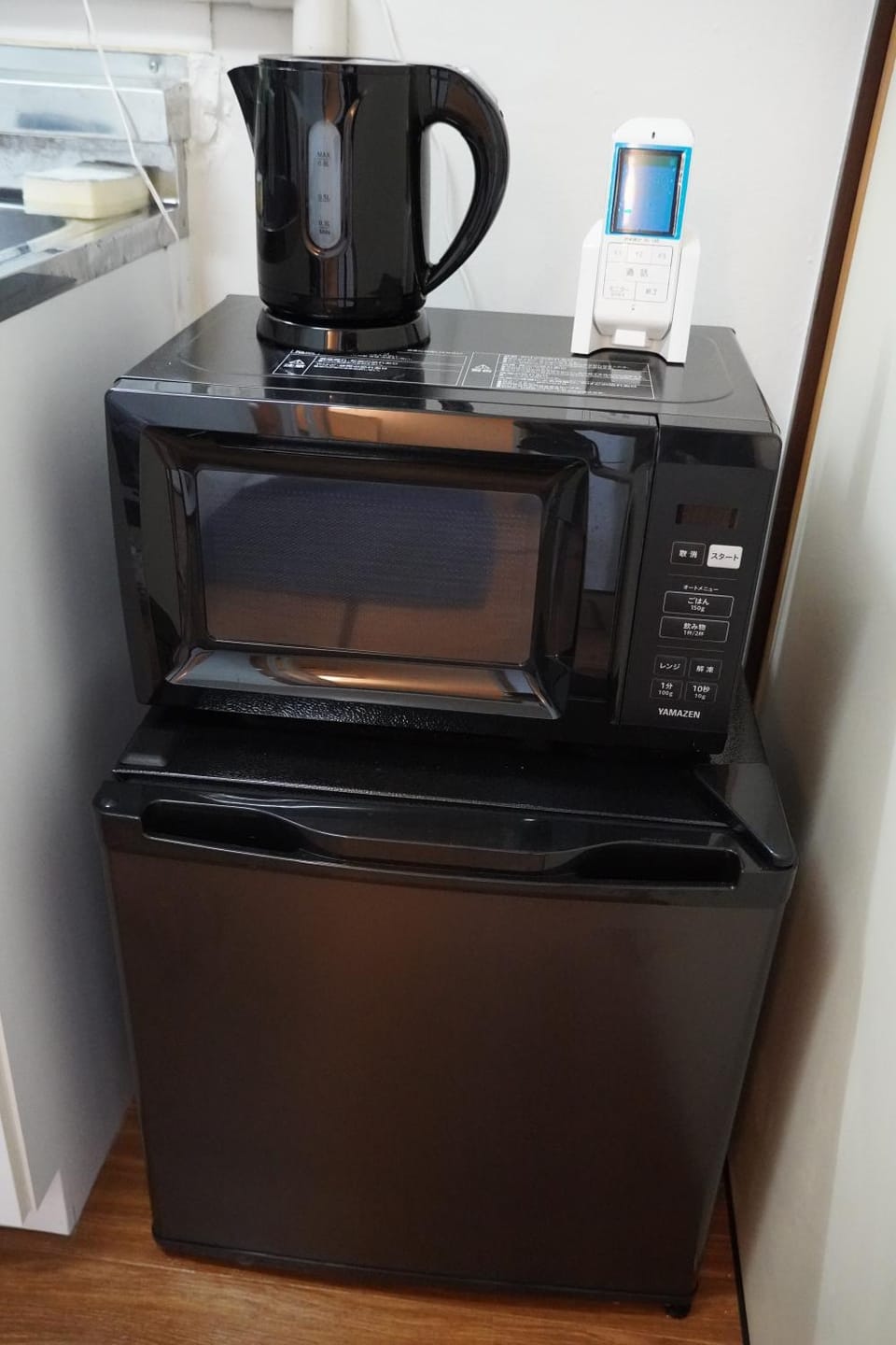 Kitchen or kitchenette, microwave