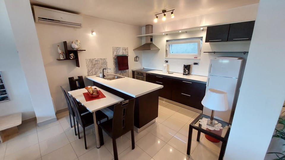Dining area, dishwasher, oven, stove, kitchen