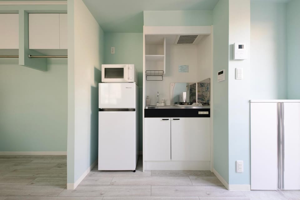 Kitchen or kitchenette, stove