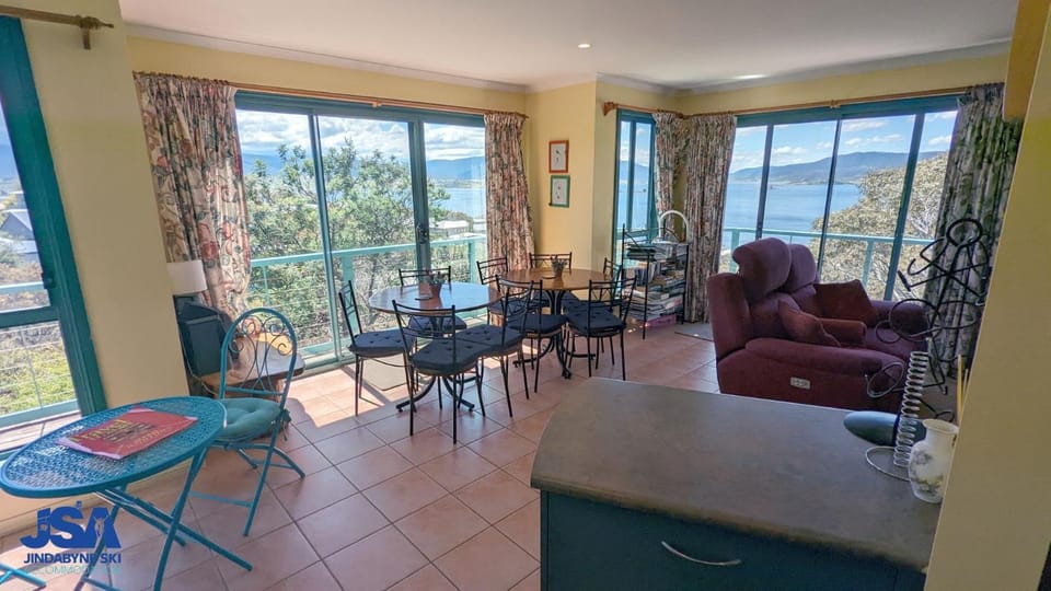 Natural landscape, View (from property/room), Living room, Seating area, Dining area