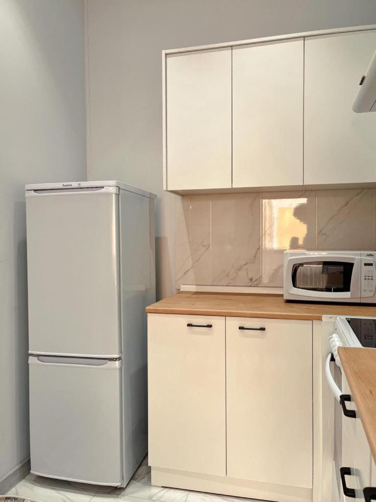 Уютная евродвушка в ЖК Forum Residence Apartment in Almaty